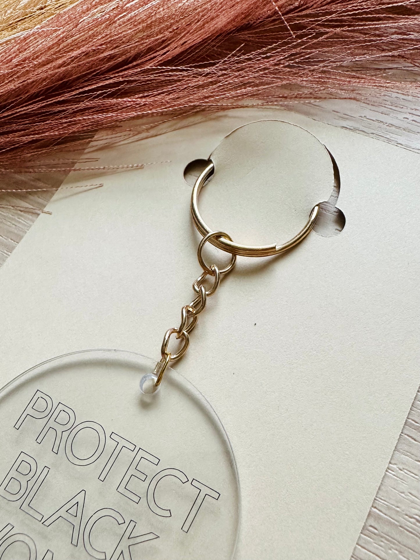 ‘Protect Black Women’ Gold Keychain